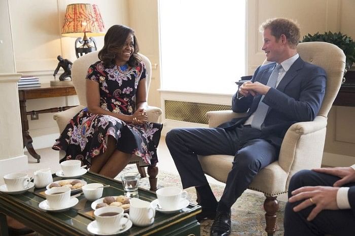 First Lady Michelle Obama and Prince Harry at Kensington Palace in 2015.