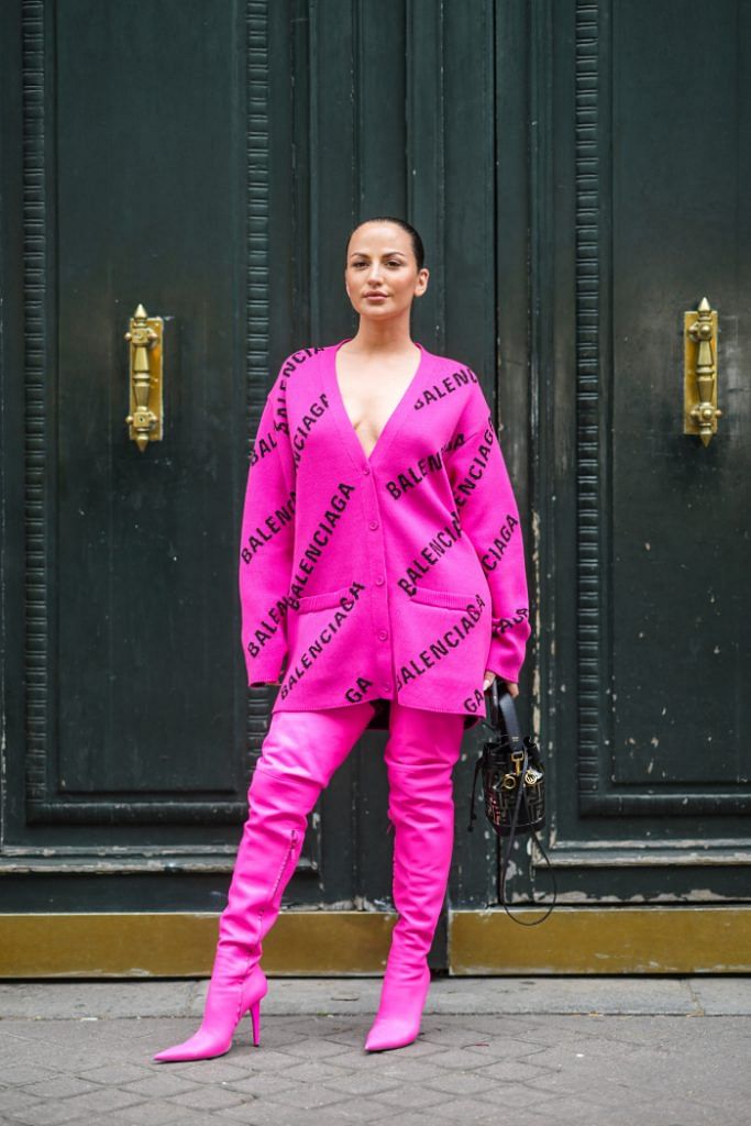 Seven Wildly Different Ways To Style A Vibrant Pink Outfit-Cardigan and Boots